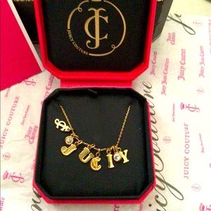Juicy couture 25” long gold w/crystals black label in original box